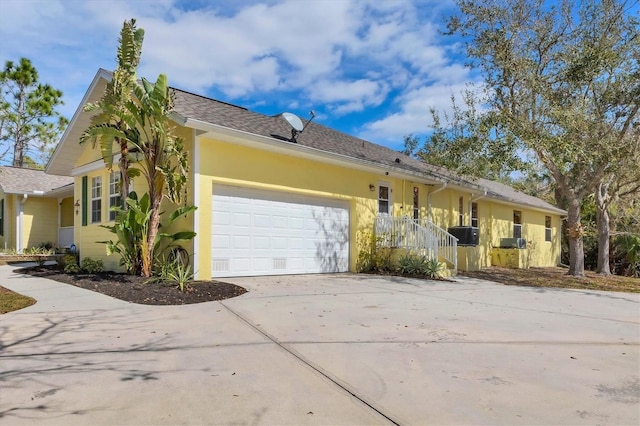 4050 Rock Creek Dr, Port Charlotte, FL 33948 - single story home featuring an attached garage, driveway, and stucco siding