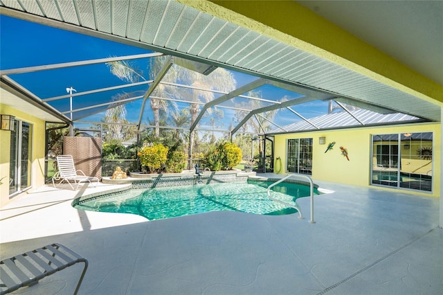 outdoor pool featuring a lanai and a patio