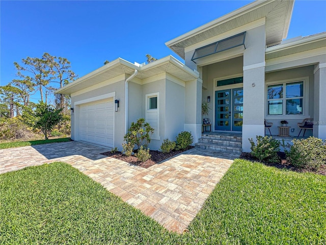 entrance to property with an attached garage, a porch, decorative driveway, and stucco siding