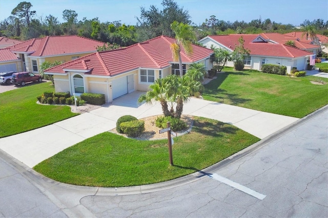 view of front of home featuring a residential view, a tile roof, driveway, and a front lawn