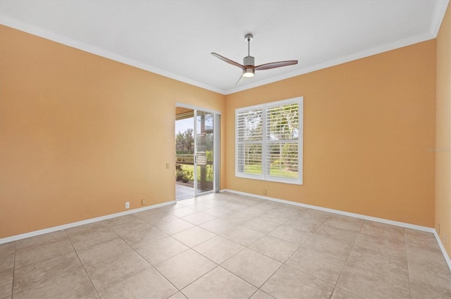 empty room featuring a ceiling fan, crown molding, baseboards, and light tile patterned floors