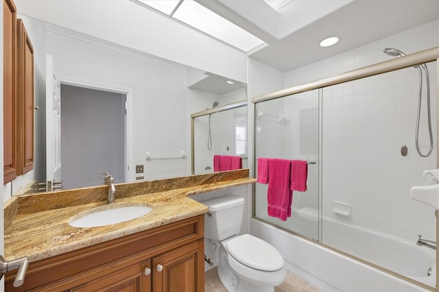 bathroom featuring bath / shower combo with glass door, toilet, tile patterned floors, vanity, and recessed lighting