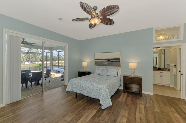 bedroom featuring access to exterior, visible vents, baseboards, and wood finished floors