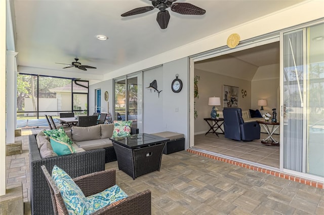 sunroom with ceiling fan