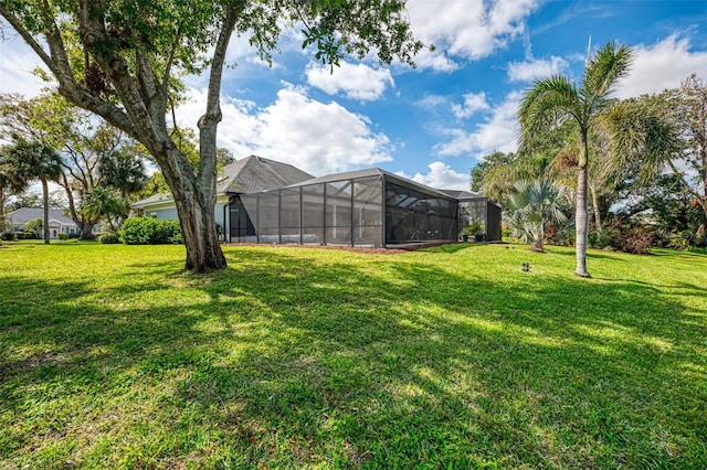 view of yard featuring a lanai