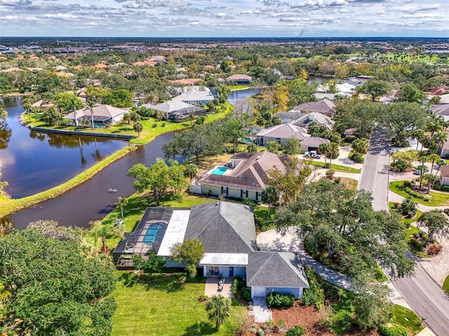 aerial view with a water view and a residential view