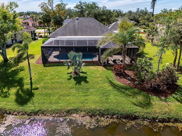 drone / aerial view with a water view