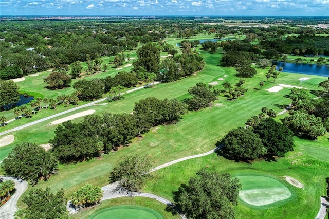 birds eye view of property featuring a water view and golf course view