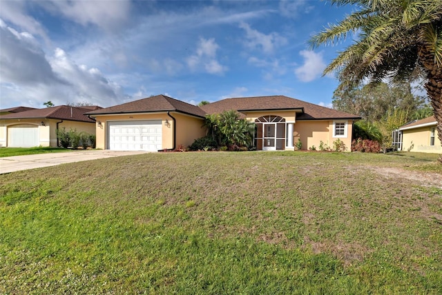 view of front of house featuring a front yard and a garage