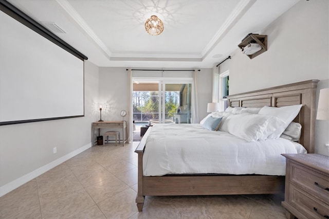 bedroom with crown molding, a tray ceiling, baseboards, and access to exterior