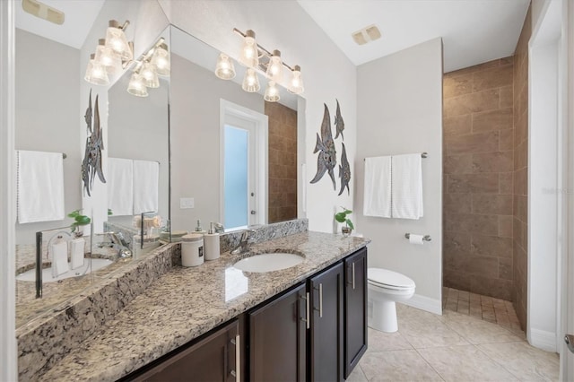 bathroom with a walk in shower, tile patterned flooring, toilet, visible vents, and vanity