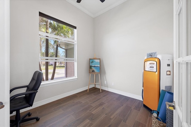 office area featuring dark wood-type flooring, crown molding, baseboards, and a ceiling fan