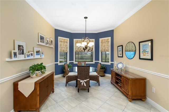 dining room with an inviting chandelier, baseboards, ornamental molding, and light tile patterned flooring