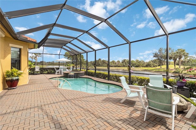 view of swimming pool with a lanai, a patio area, and a pool with connected hot tub