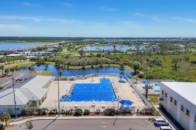 birds eye view of property featuring a water view