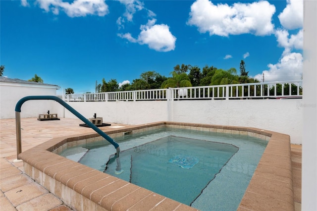 view of pool with a fenced backyard