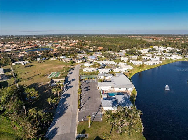 aerial view with a water view and a residential view