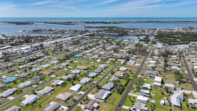 aerial view with a residential view and a water view