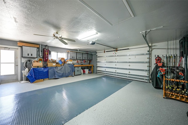 garage featuring a garage door opener and ceiling fan