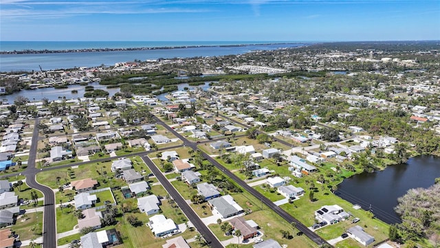 aerial view featuring a residential view and a water view