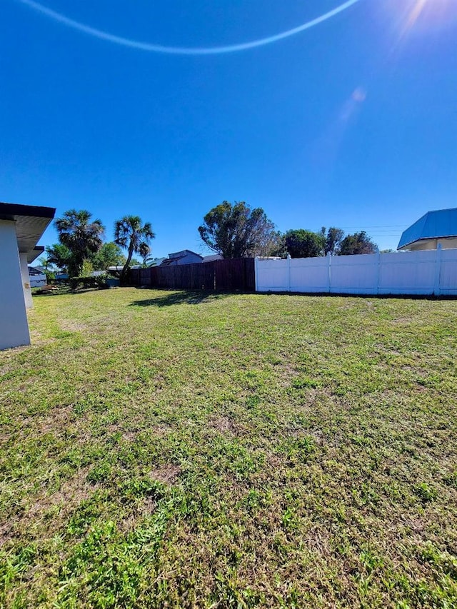 view of yard with fence