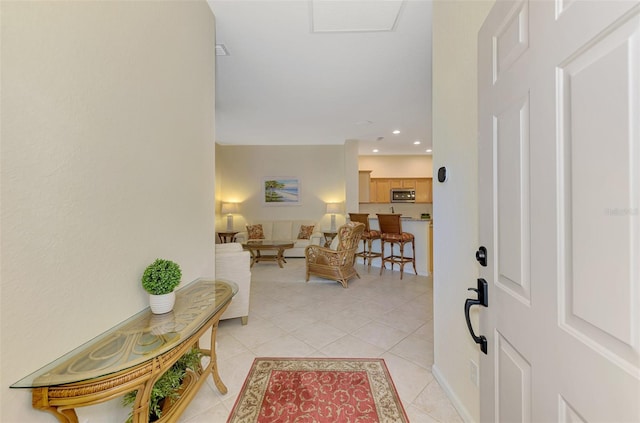 foyer with recessed lighting, visible vents, and light tile patterned flooring