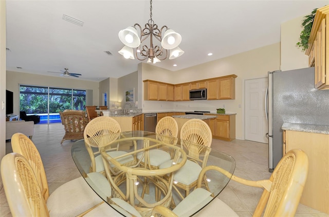 dining room featuring ceiling fan with notable chandelier, visible vents, recessed lighting, and light tile patterned floors