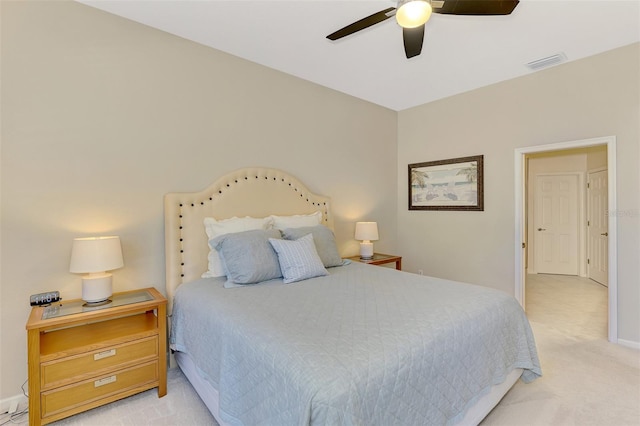 bedroom with ceiling fan, carpet floors, visible vents, and baseboards