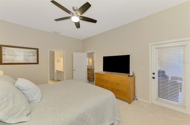 bedroom featuring baseboards, visible vents, connected bathroom, light colored carpet, and ceiling fan