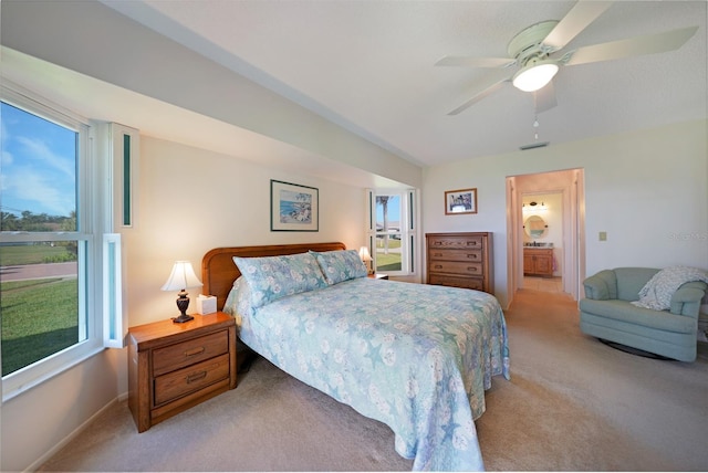 bedroom with light carpet, multiple windows, and visible vents