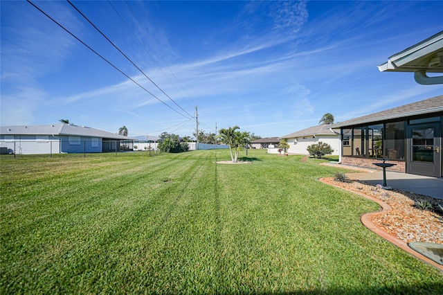 view of yard with fence