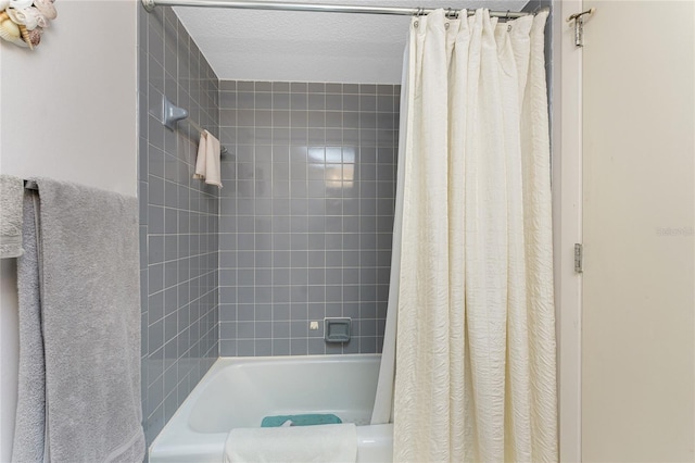 full bathroom with shower / bath combo