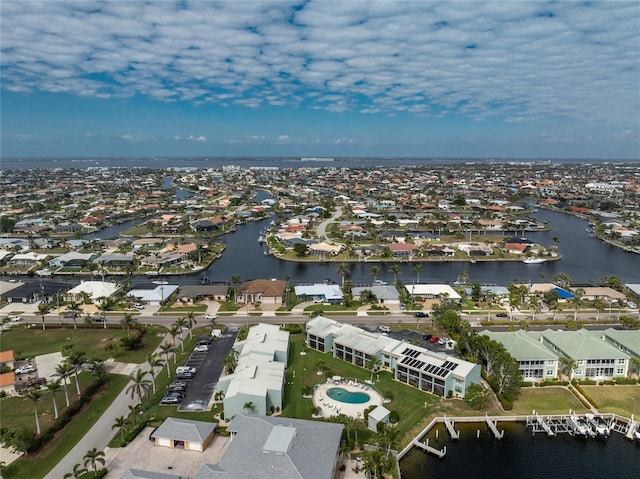 aerial view featuring a water view and a residential view