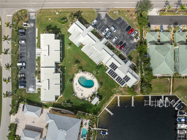 aerial view featuring a water view and a residential view