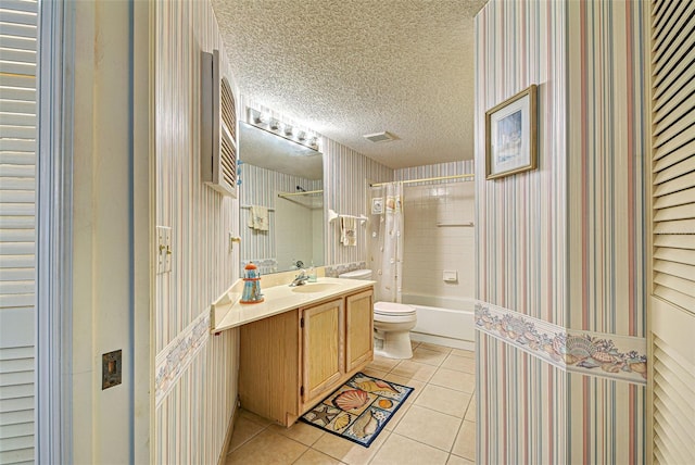 bathroom with shower / tub combo with curtain, toilet, vanity, a textured ceiling, and tile patterned floors