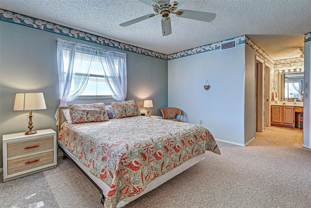 carpeted bedroom featuring ceiling fan, multiple windows, visible vents, and a textured ceiling