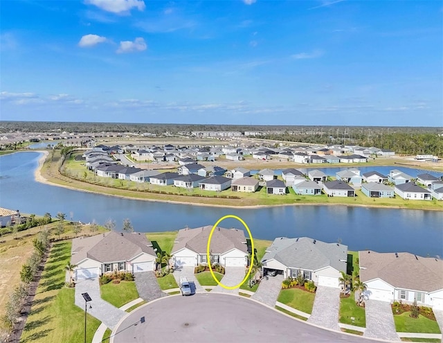 aerial view featuring a water view and a residential view