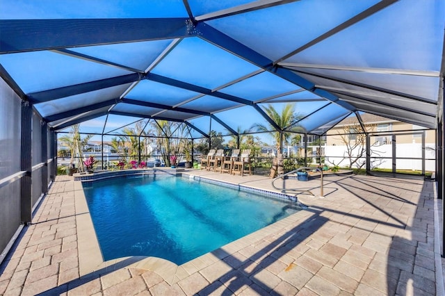 pool featuring a lanai and a patio