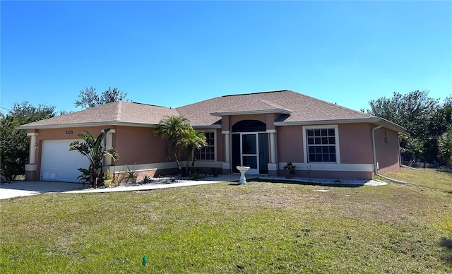 single story home featuring a shingled roof, a front lawn, stucco siding, driveway, and an attached garage