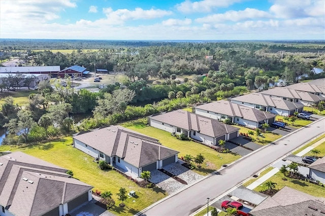 birds eye view of property with a residential view