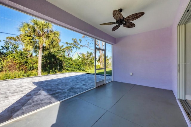 exterior space with a ceiling fan