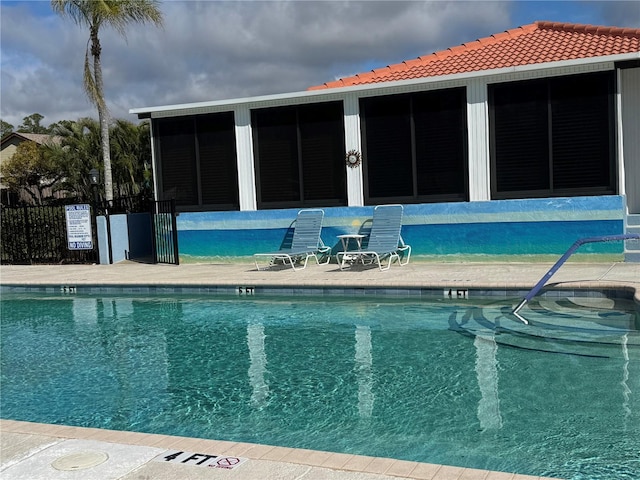 pool featuring fence