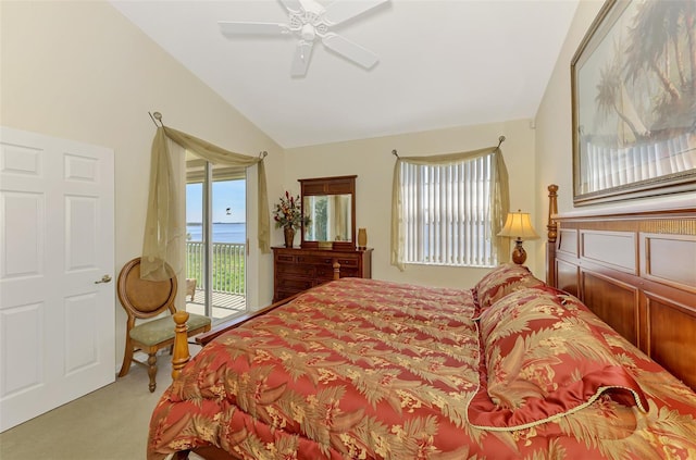 bedroom featuring light carpet, access to exterior, multiple windows, and lofted ceiling