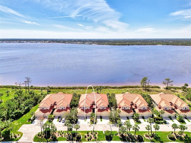 aerial view featuring a residential view and a water view