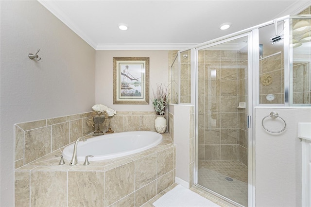 bathroom featuring ornamental molding, a stall shower, and a bath