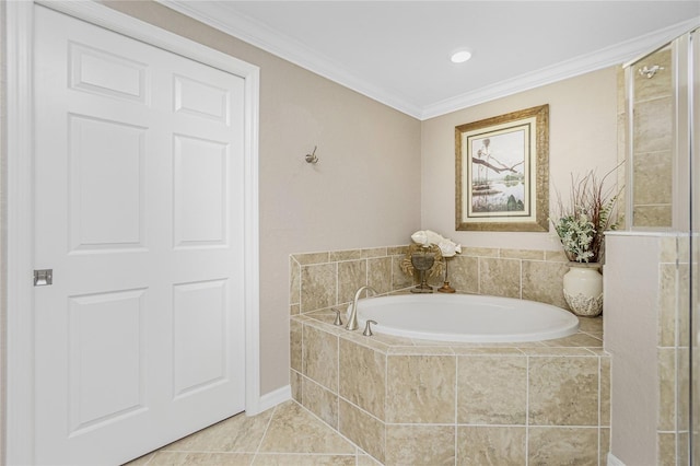 bathroom featuring a garden tub, ornamental molding, and tile patterned floors