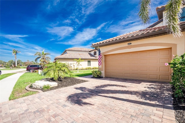 exterior space with decorative driveway