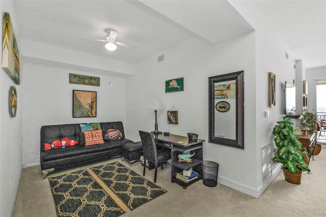 living room featuring carpet floors, visible vents, ceiling fan, and baseboards