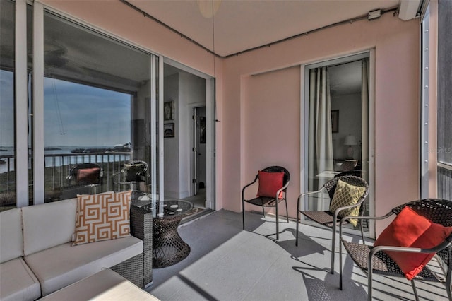 balcony with an outdoor hangout area