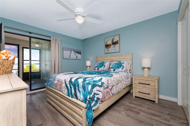 bedroom with access to exterior, a ceiling fan, baseboards, and wood finished floors